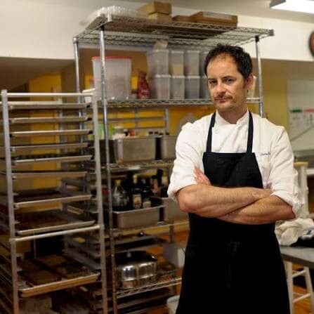 Christophe Paume in the kitchen at Christophe in Charleston